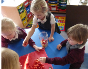 preparing fruit for smoothie